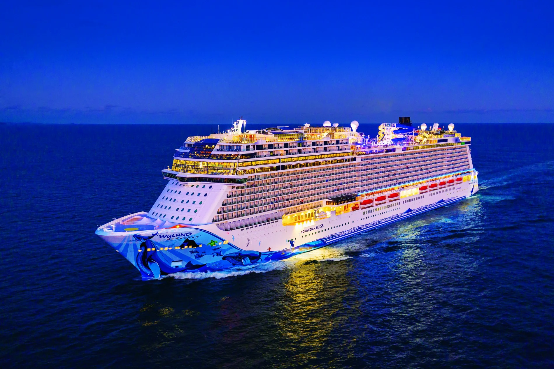 Norwegian Bliss illuminated at night